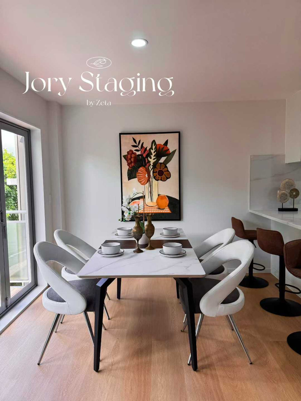 Dining room with white sculptural chairs
