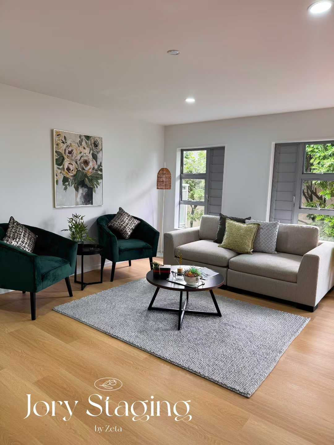 Living room with green accent chairs